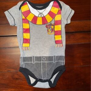 Warner Bros. Gray and Black Onesie with Red and Yellow Design